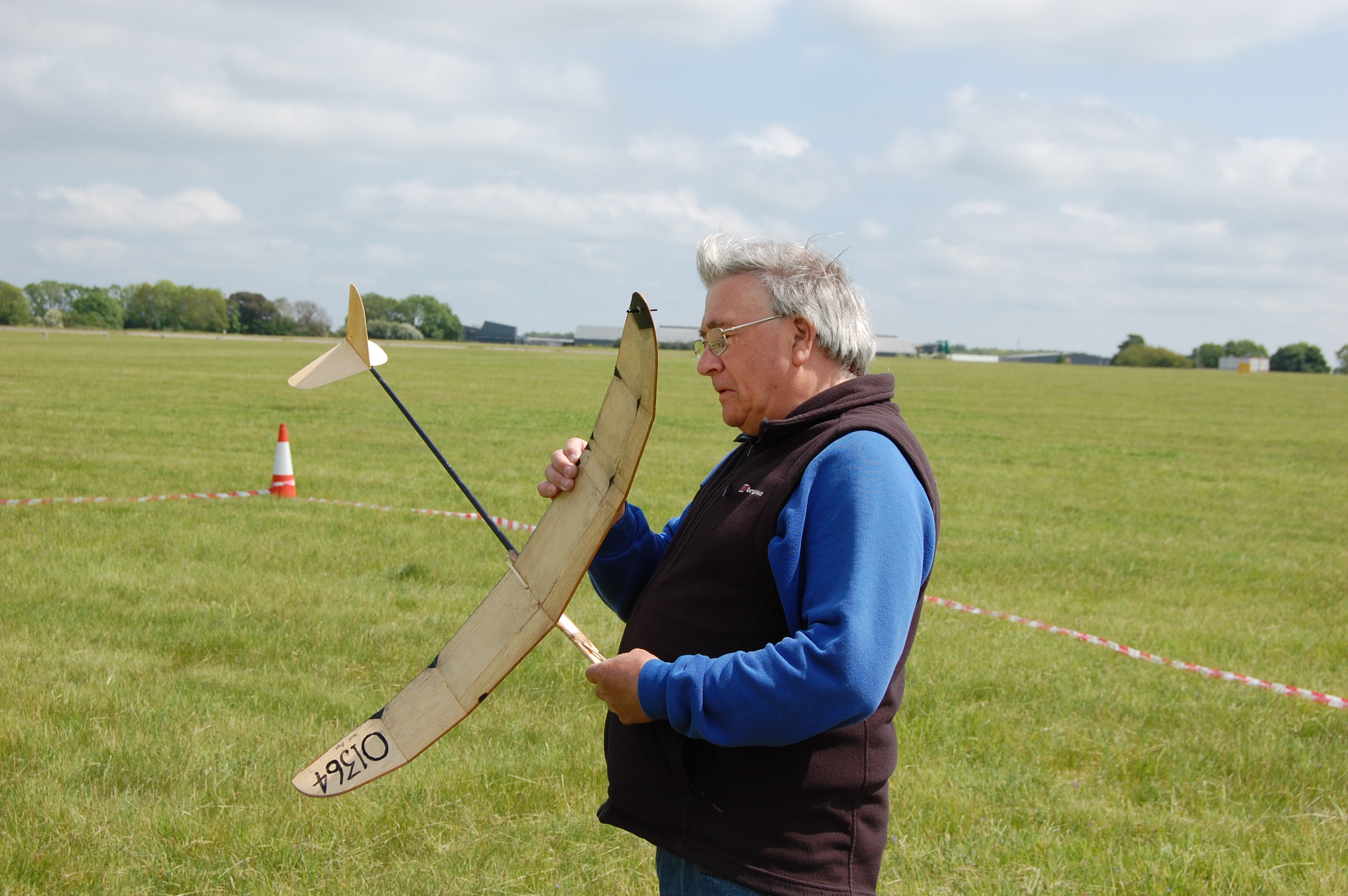 Mike Page   with tip-launched HLG   Note balsa wing
