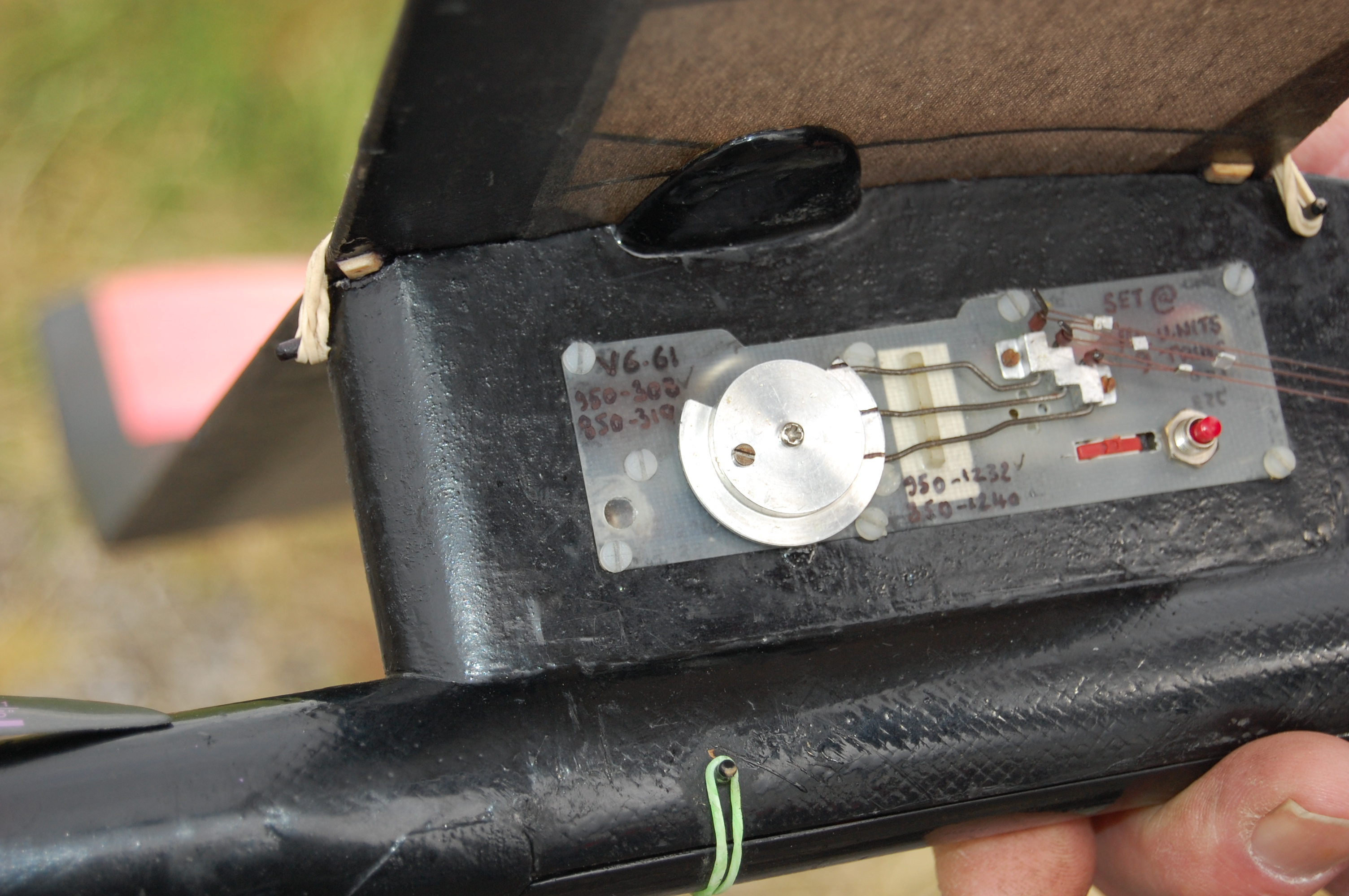 Trevor Grey looks harassed despite success in F1Q. close-up of the electronic controller and timer.